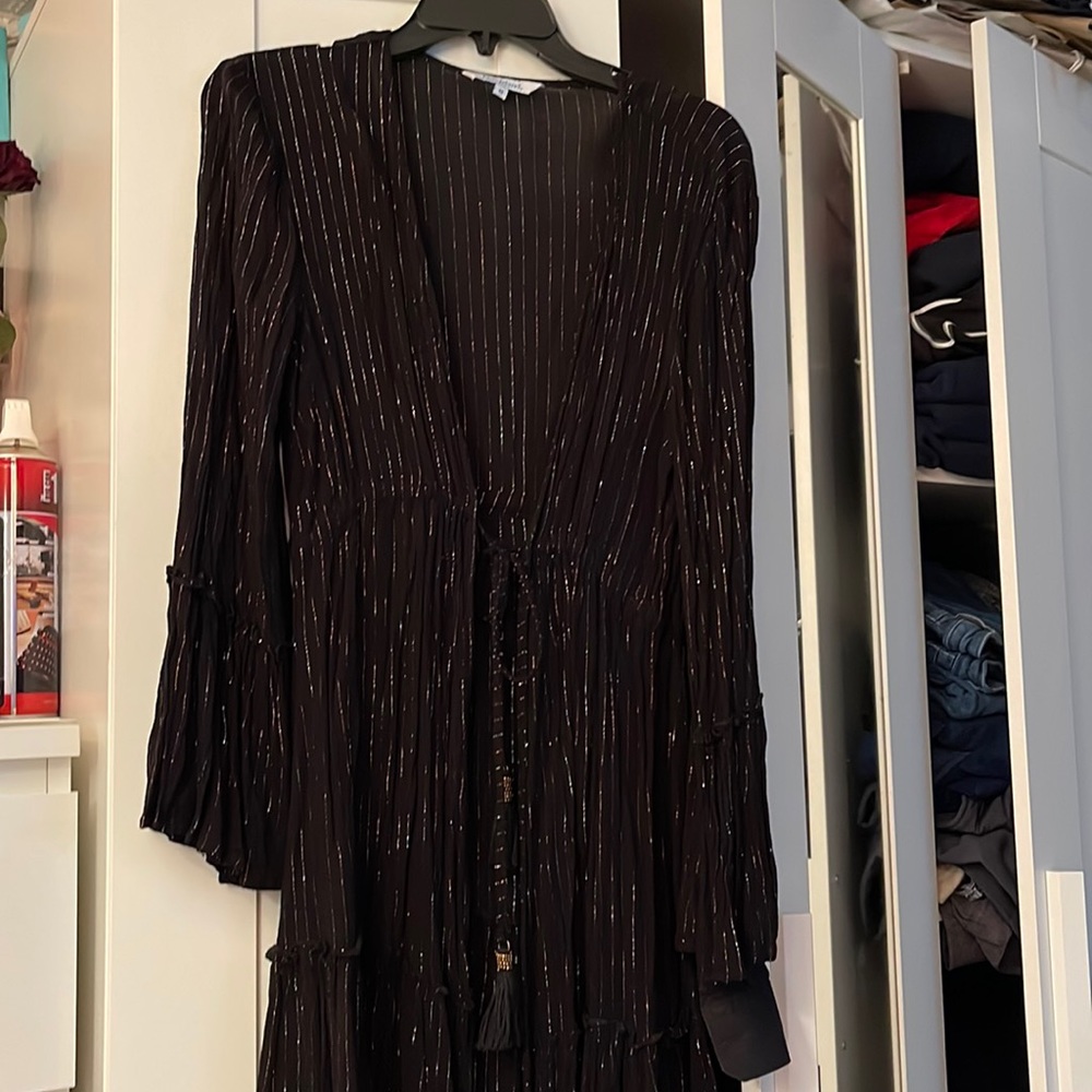Ruffle bottoms long sleeve cover up